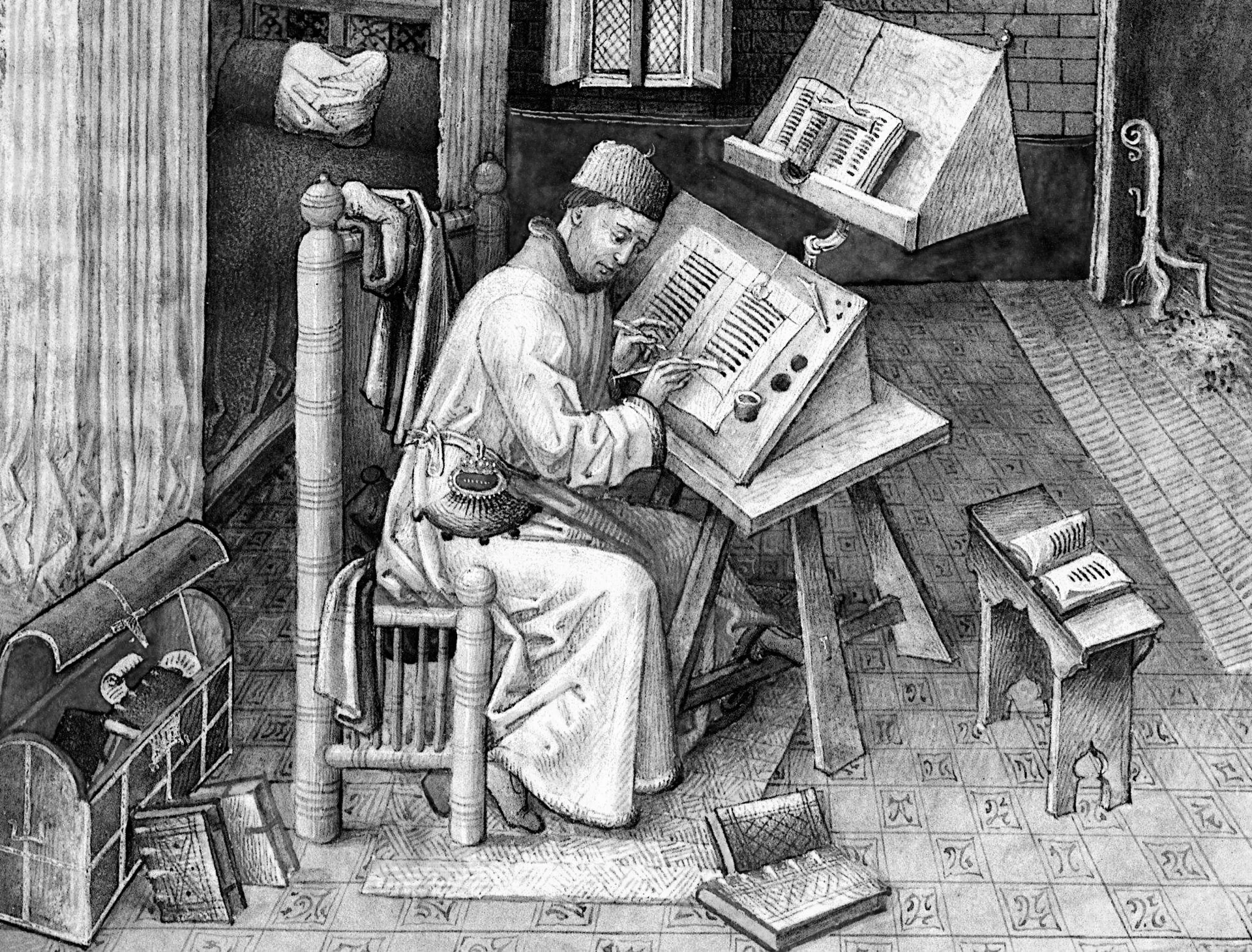 A fifteenth century miniature of the scribe Jean Miélot at his writing desk, surrounded by books.